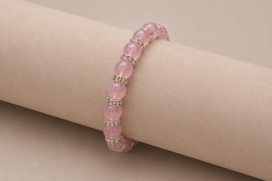 Iridescent pink glass bead bracelet with rhinestone spacers