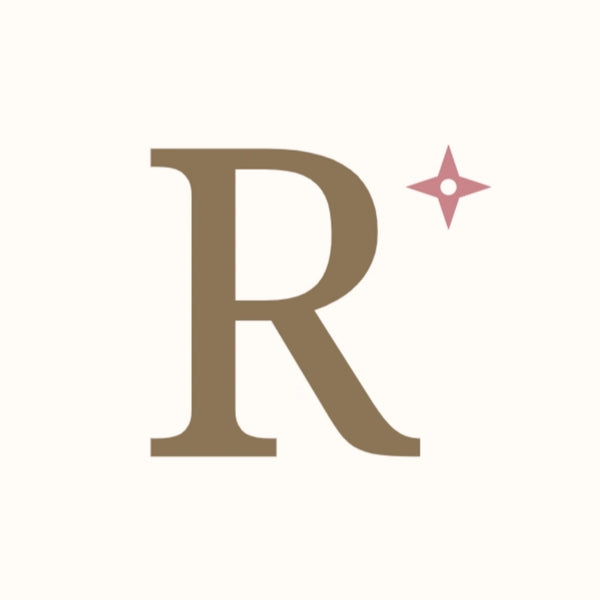 Large brown 'R' with a pink star on a white background