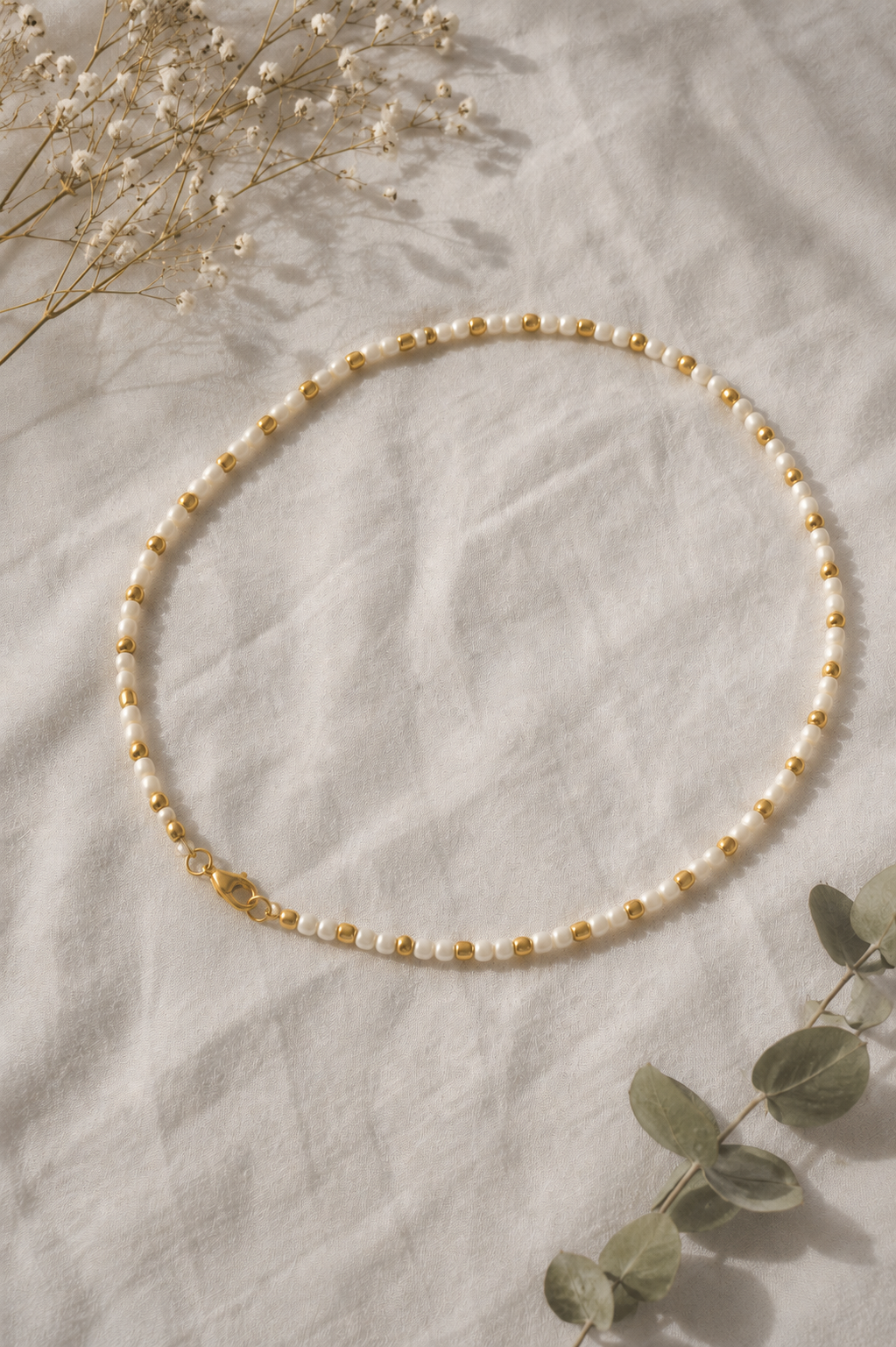 Handmade white and gold seed bead necklace by Remillie Jewellery